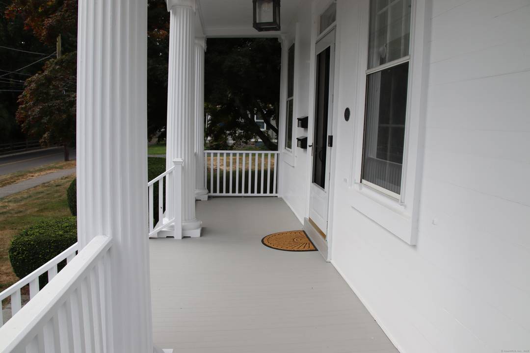 Nestled in the heart of the Milford Historic District, this beautifully updated second floor unit perfectly blends historic elegance with modern convenience.