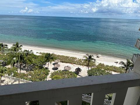 COME SEE AND ENJOY THIS BREATHTAKING VIEWS WITH DIRECT BEACH ACCESS AS YOUR BACK YARD.