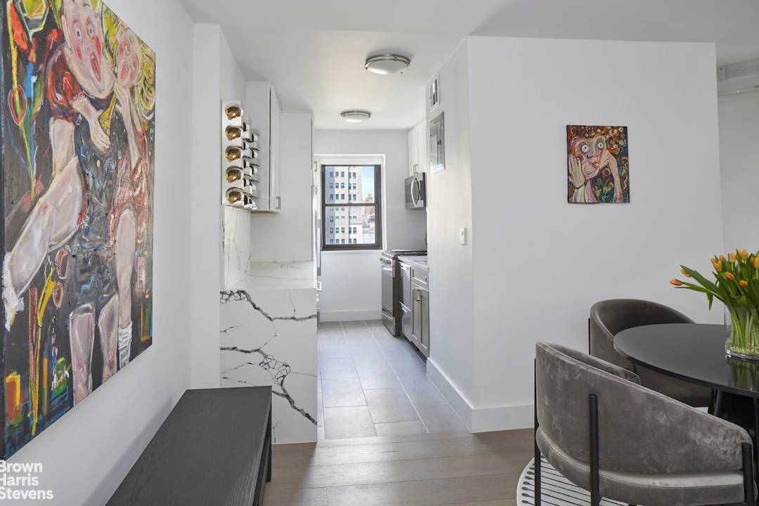 Rarely does such a beautifully renovated apartment come on the market in The Eastwinds Condominium.