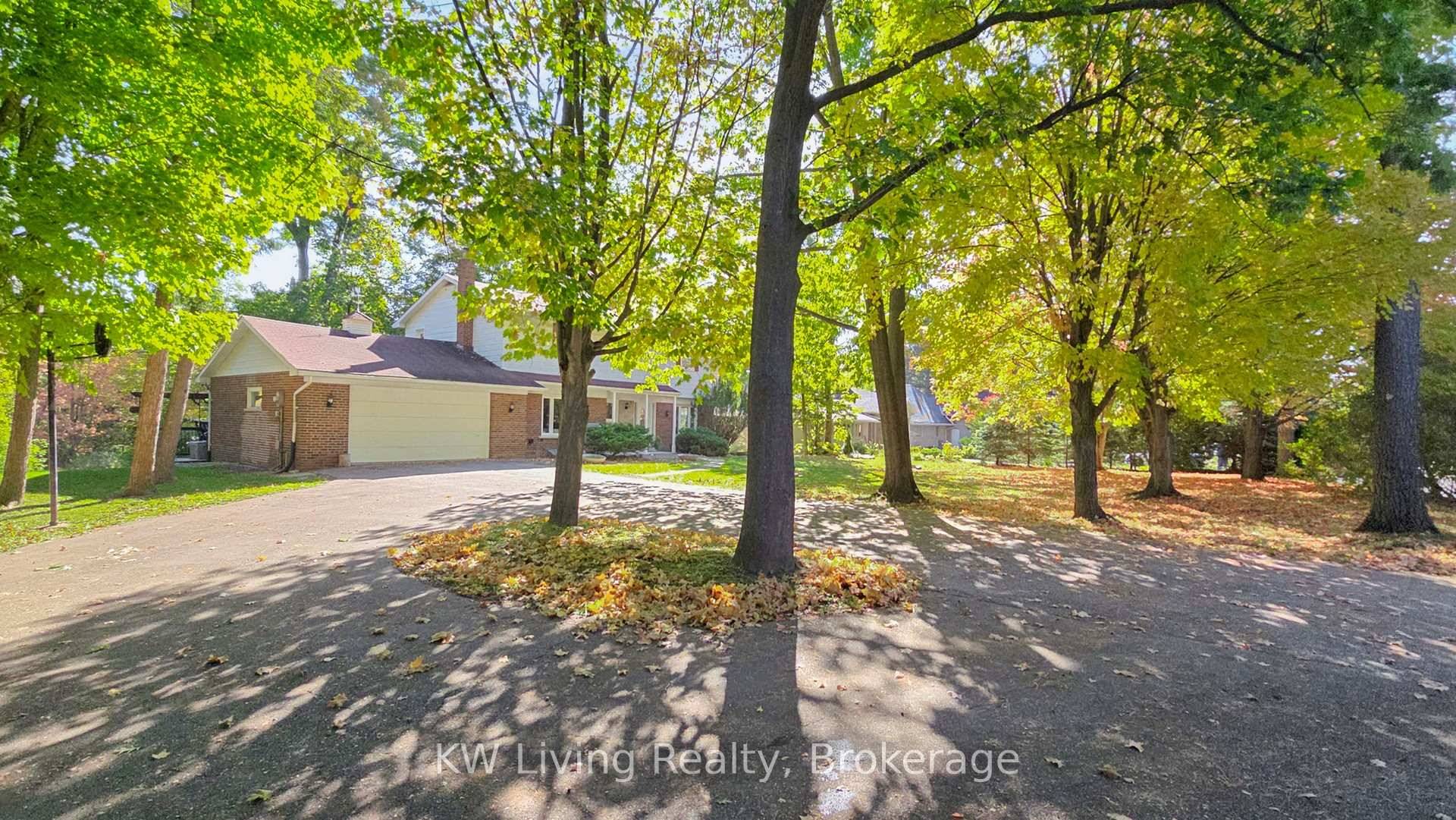 This magnificent 1 acre property in the prestigious Cachet neighborhood features its own creek winding through a lush, treed ravine.