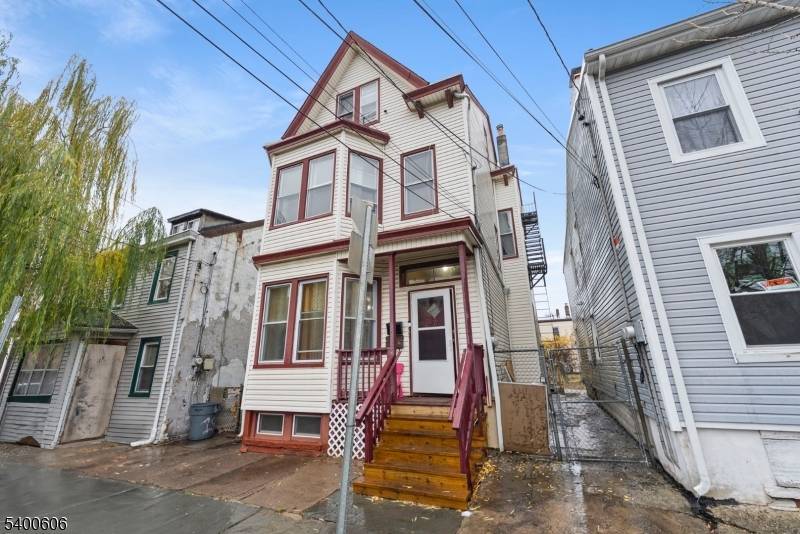 This beautifully renovated legal three family home offers three separate units, each unit with 2 bedrooms and a spacious kitchen.