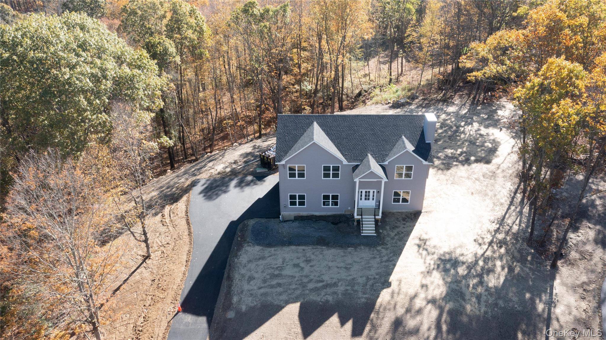 Be the first to live in this stunning NEW construction home situated on over 5 acres of land in the Carmel School District.