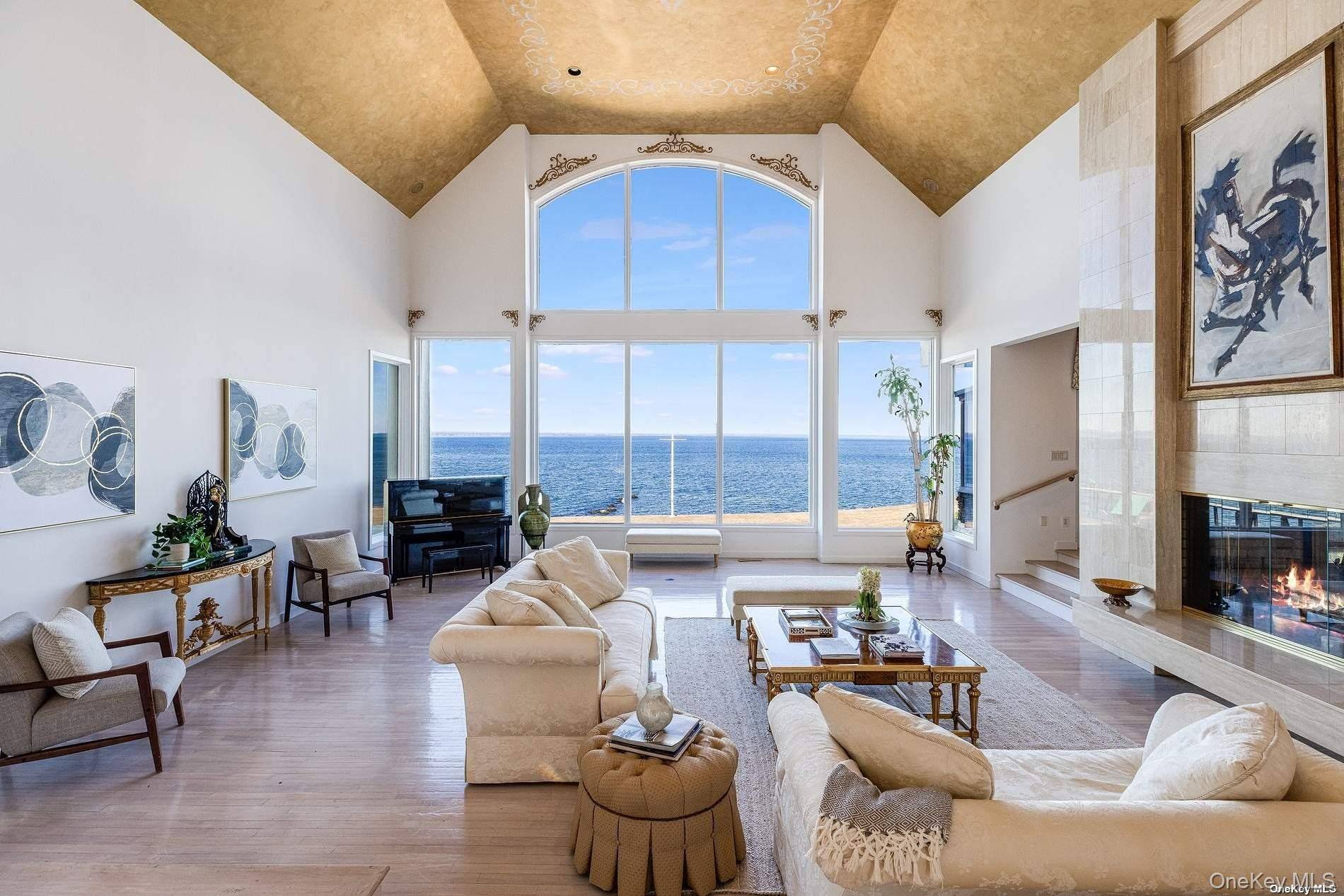 Presenting A 12, 000 Sq Ft Living Space WATERFRONT Mansion With Over 200 FT Of Coastline Featuring An Upper And Lower Beach Area !