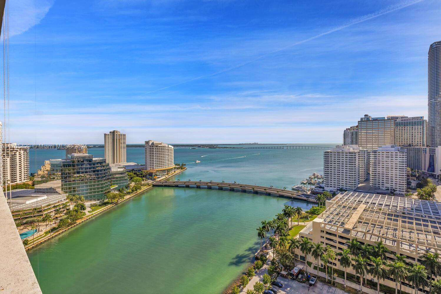 Enjoy direct Bay views through stunning 16 foot floor to ceiling windows in this luxurious residence, perfectly located between Mary Brickell Park and Miami Circle Park.