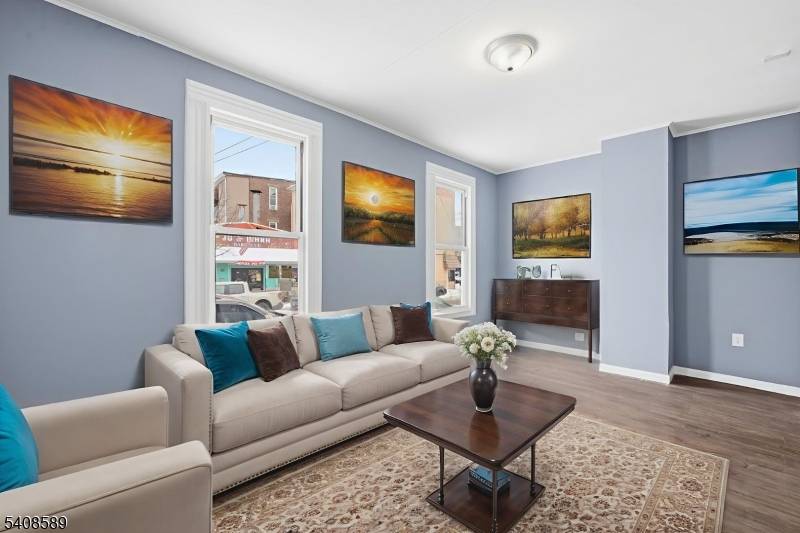 Beautifully renovated home located at 206 Clark Pl, Elizabeth, NJ featuring 4 spacious bedrooms and large bathrooms, thoughtfully updated for modern living.