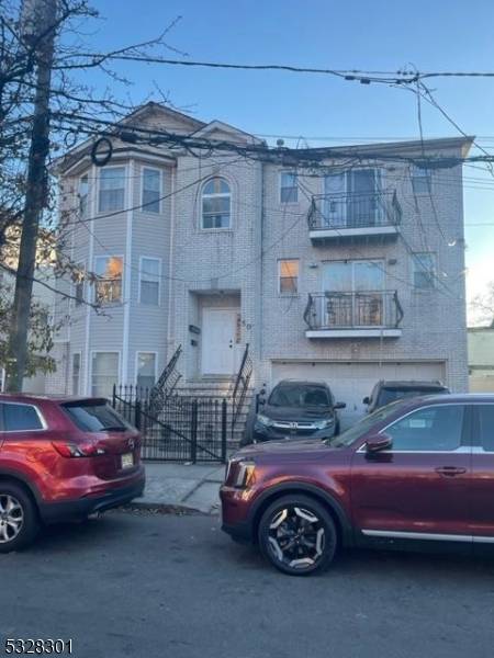 Welcome to this large 3 family home located in a quite street.