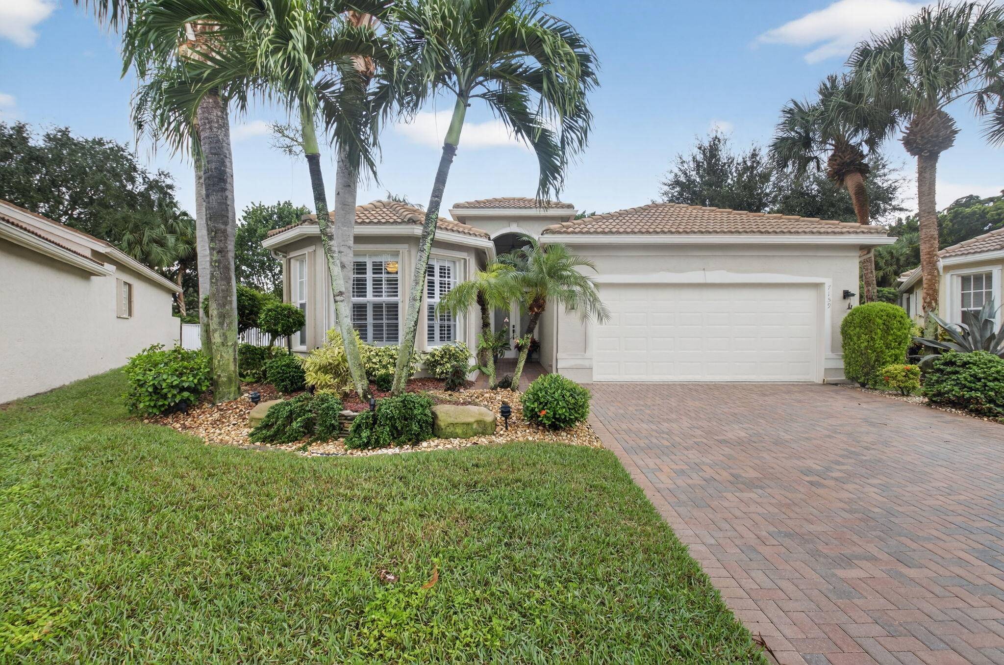 Fabulous updated 4BR 2. 1BA Gibraltar model w wall opening sits on oversized fenced in lot 8396 sq ft w room for a pool.