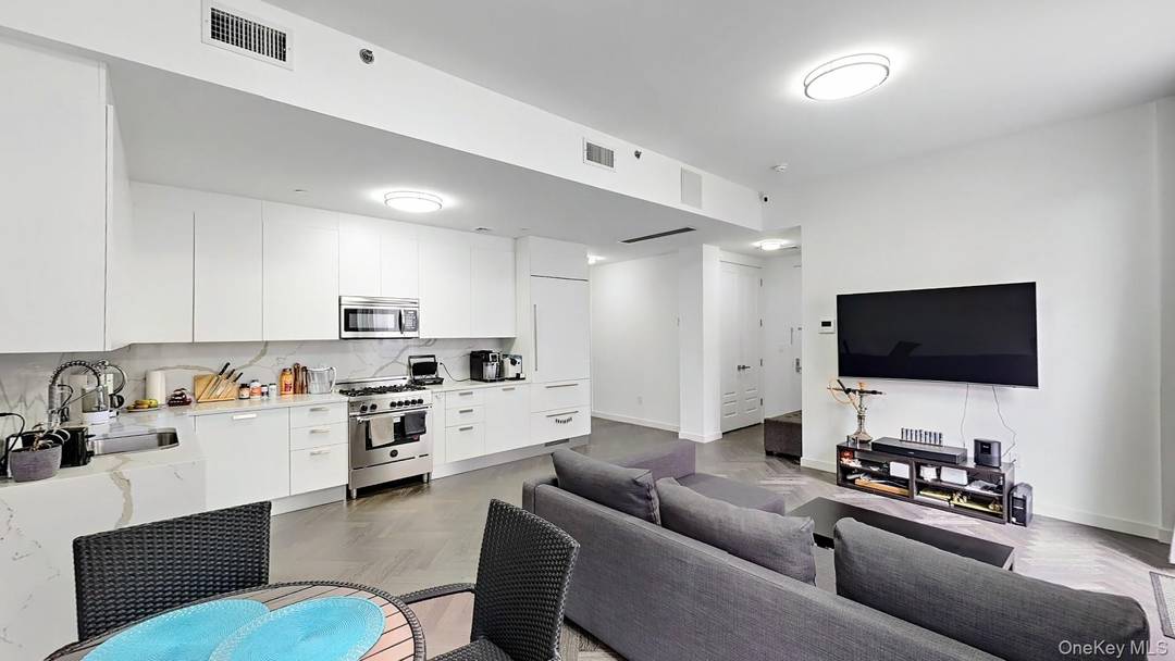 Welcome to Penthouse 5 at The Jade Condominium, a beautifully designed 3 bedroom, 2 bathroom residence offering the perfect blend of indoor luxury and outdoor living.