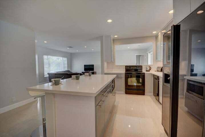 Gorgeous 3 2 pool home conveniently located in East Boca Raton neighborhood.