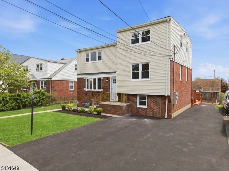 Fully renovated 2 family home in the heart of Clifton offering modern finishes and exceptional versatility !
