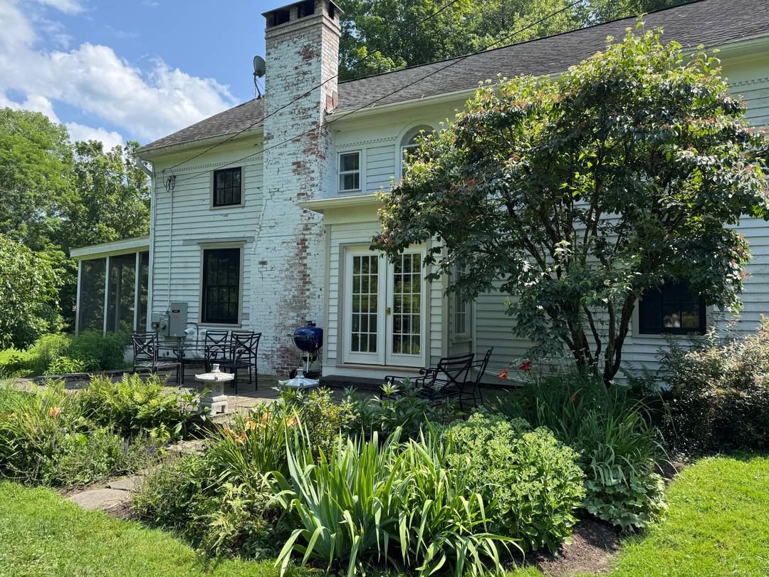 Discover timeless charm at 28 White Hollow Road, a stunning 1850 antique home in the heart of Lakeville, CT.