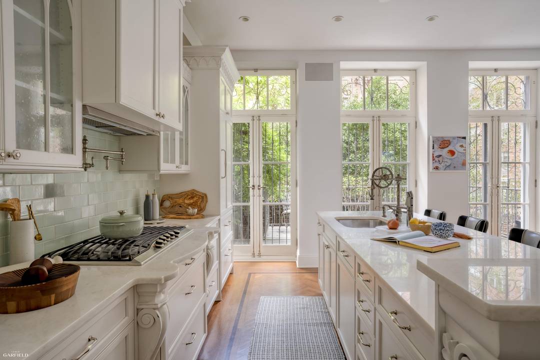 Nestled on one of Manhattans most storied and picturesque blocks, this renovated single family townhouse offers the rare combination of historic charm and modern upgrades.