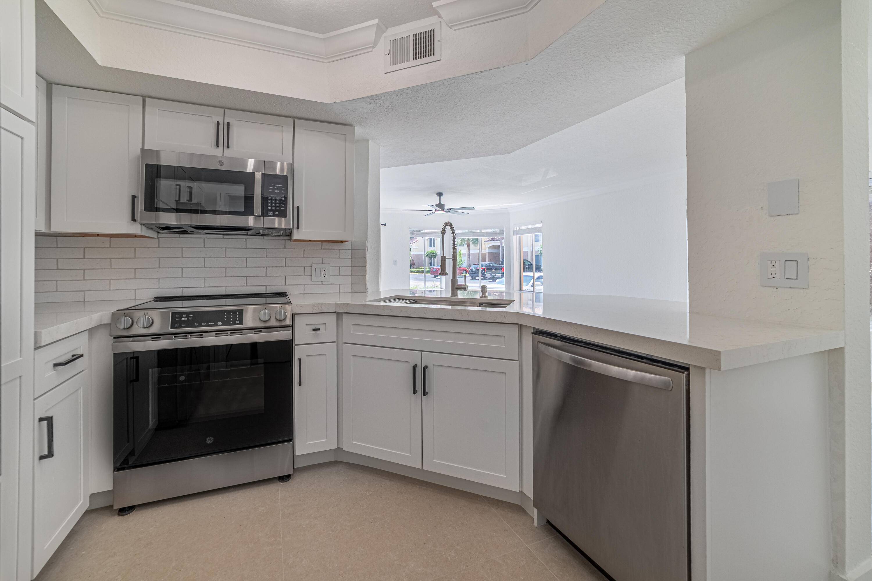 Enjoy living in this beautifully Renovated 2 bedroom, 2 bathroom corner unit located on the first floor in the highly desirable community of Casablanca Isles.