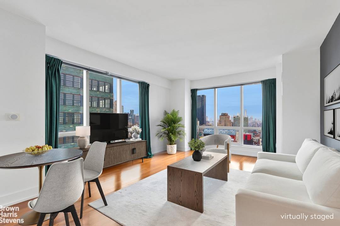Set high above Midtown with sweeping skyline views and exceptional corner light, Residence 38E at The Orion is the largest and most desirable one bedroom layout in the building.
