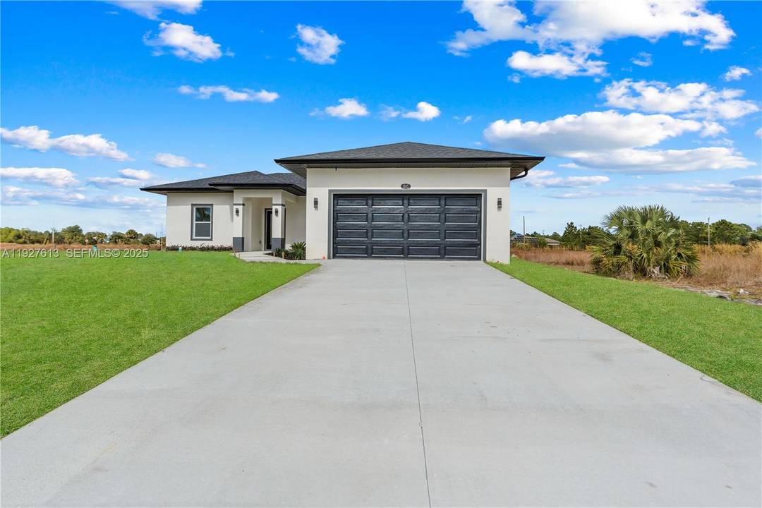 Experience pristine Florida living in this brand new, never occupied home perfectly positioned on a tranquil canal.