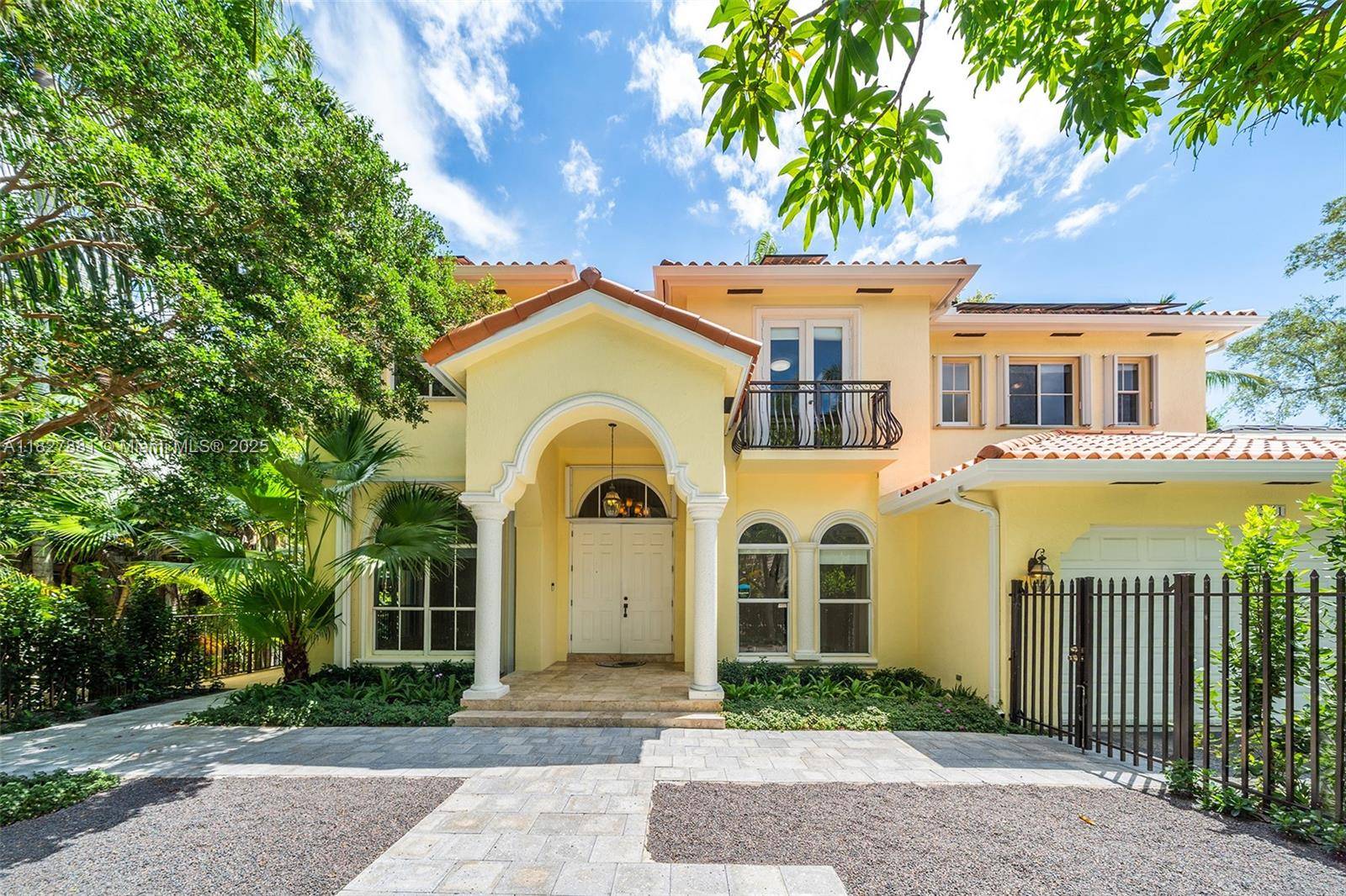 Rarely available 5BD retreat on quiet Coconut Grove cul de sac !