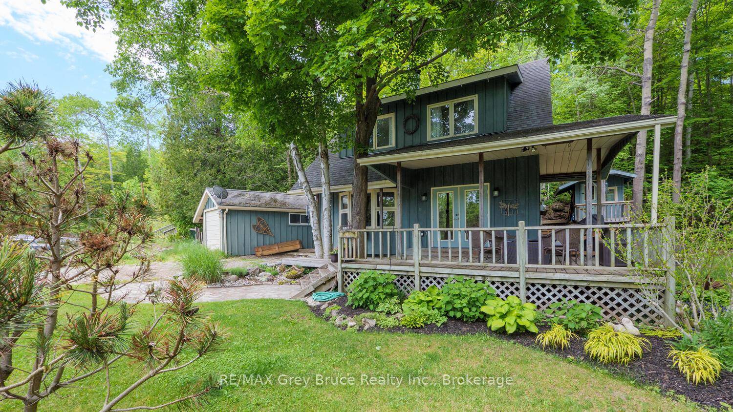 Located in the charming Georgian bayside village of Dyer's Bay and bordered by the stunning escarpment, you'll discover 11 Shoreline Drive.
