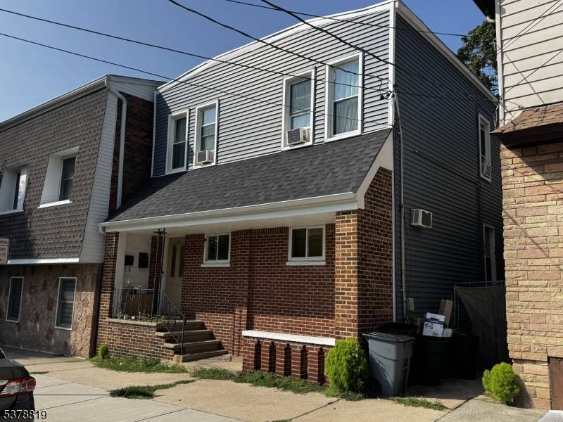 WELCOME TO THIS CHARMING AND INCOME PRODUCING 2 FAMILY HOUSE LOCATED IN THE DESIRABLE AREA OF RIDGEFIELD PARK.