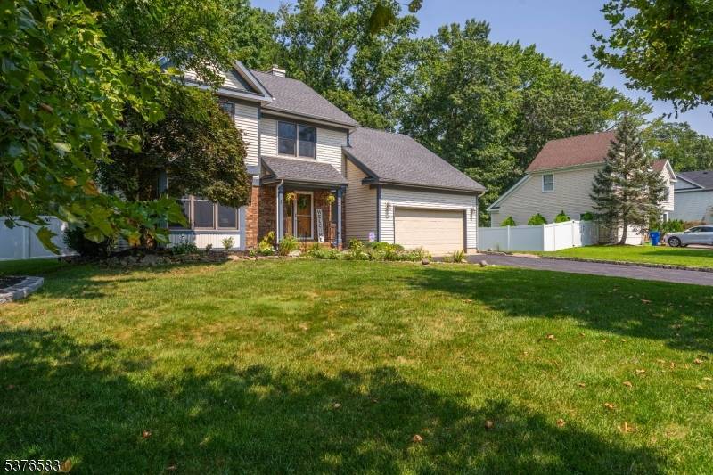 Nestled in the tree lined Oakwood Section II neighborhood, this updated colonial style home features an open floor plan filled with natural light, an inviting family room with a brick ...