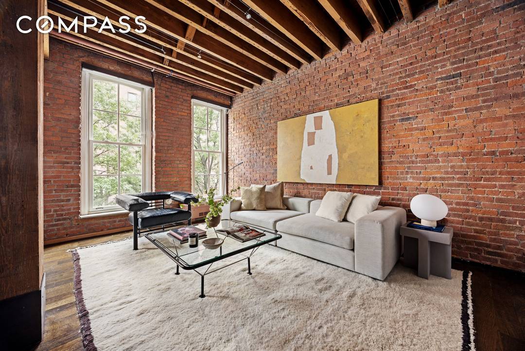 Authentic 2 BD 2 BA renovated loft with private terrace in prime Tribeca Historic District.
