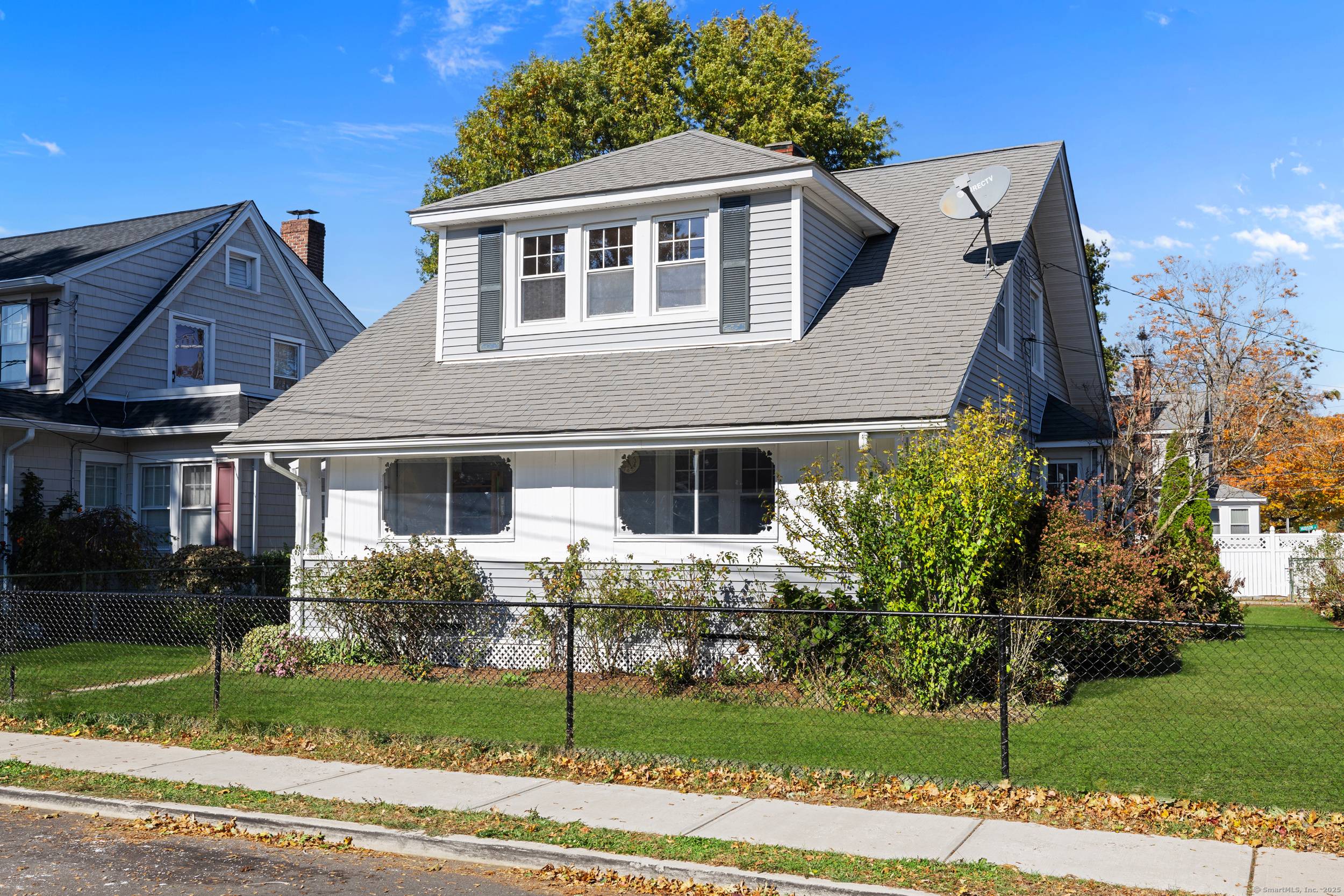 Spacious and bright Bungalow style home on a corner lot in Norwalk.