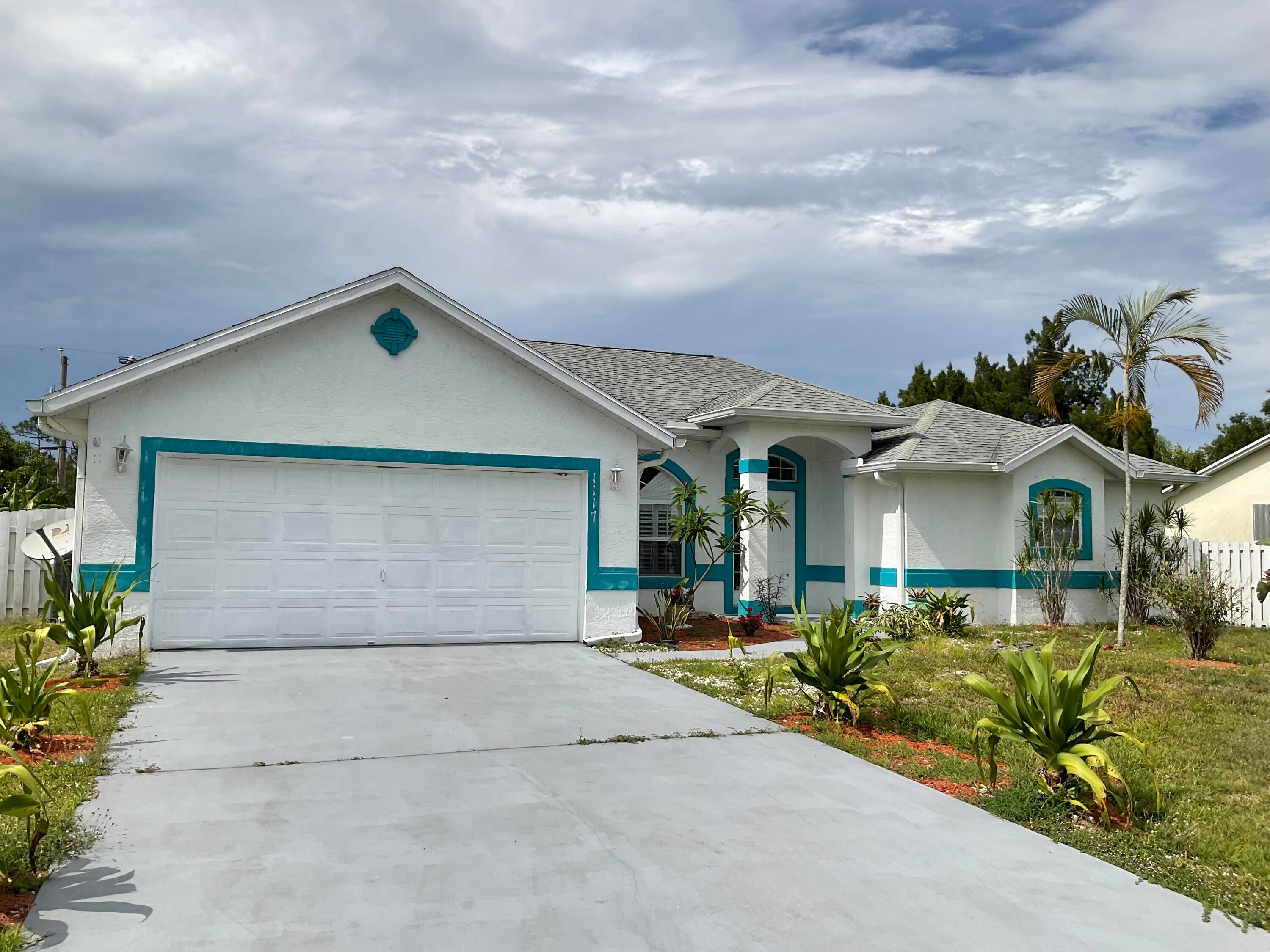 Spacious 4 BR 3 BA 2 CG CBS home in western PSL.