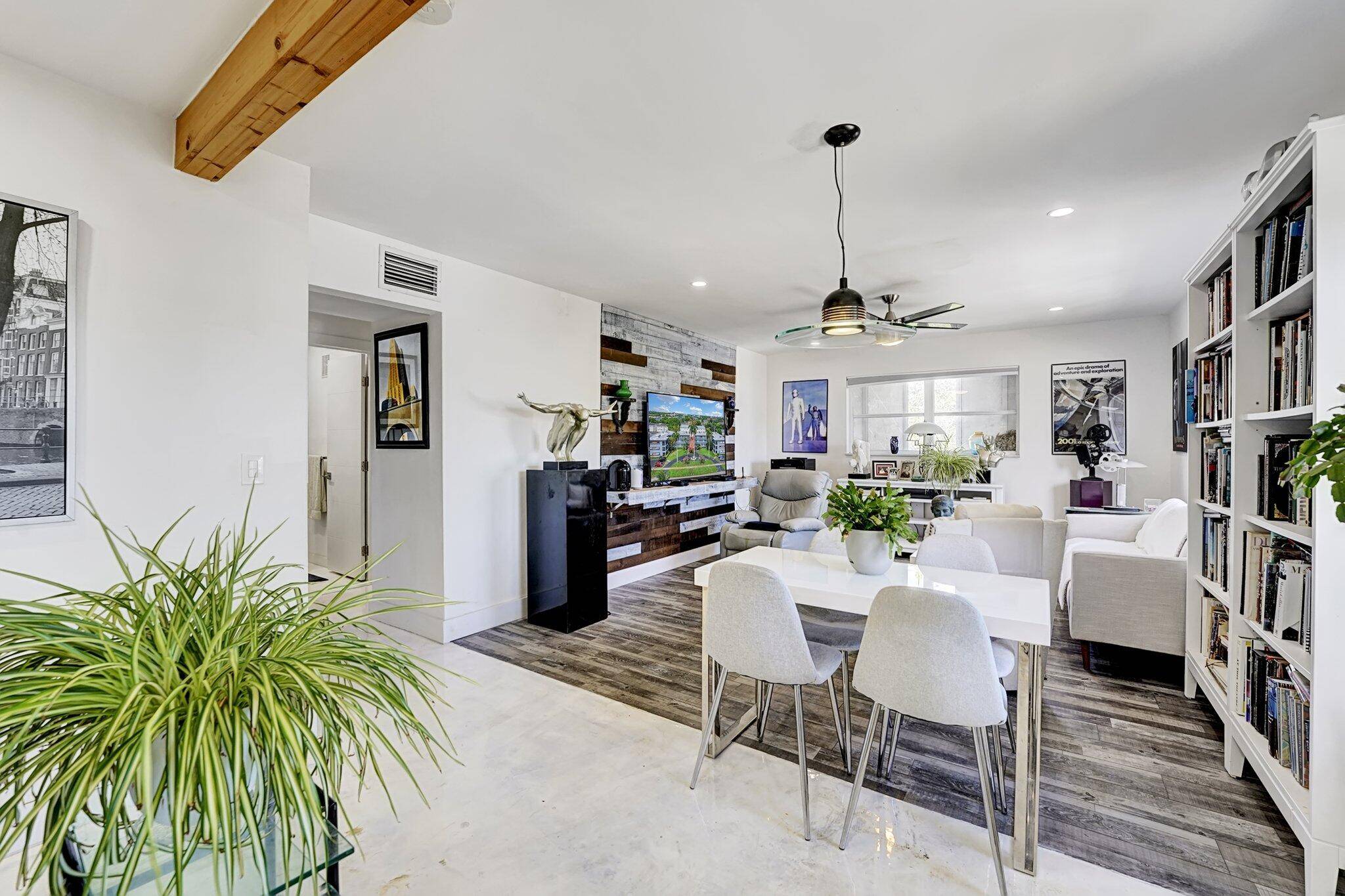 Welcome to this beautifully remodeled 2BD 1BA top floor condo in the heart of Hollywood Hills.