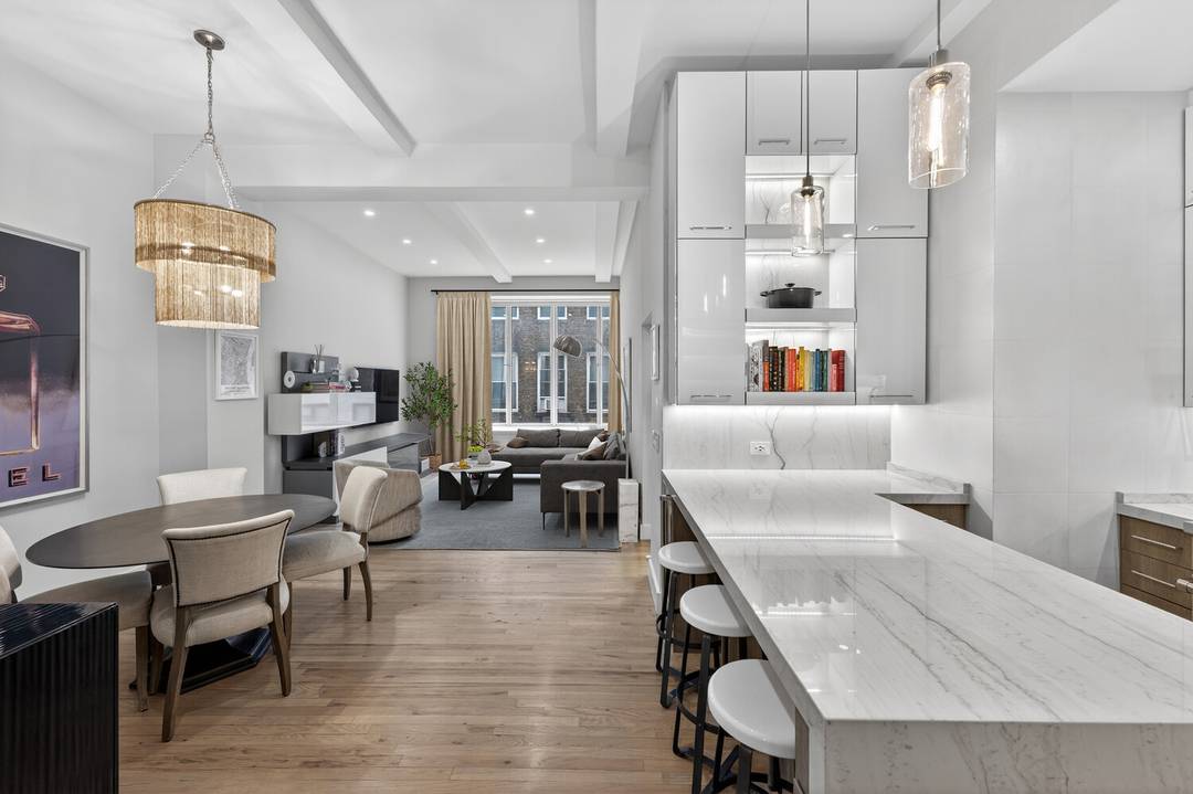 Designer Loft in Prime Flatiron Perfectly positioned just off Madison Square Park, this impeccably renovated loft blends pre war character with elevated modern design in one of Flatiron's most coveted ...