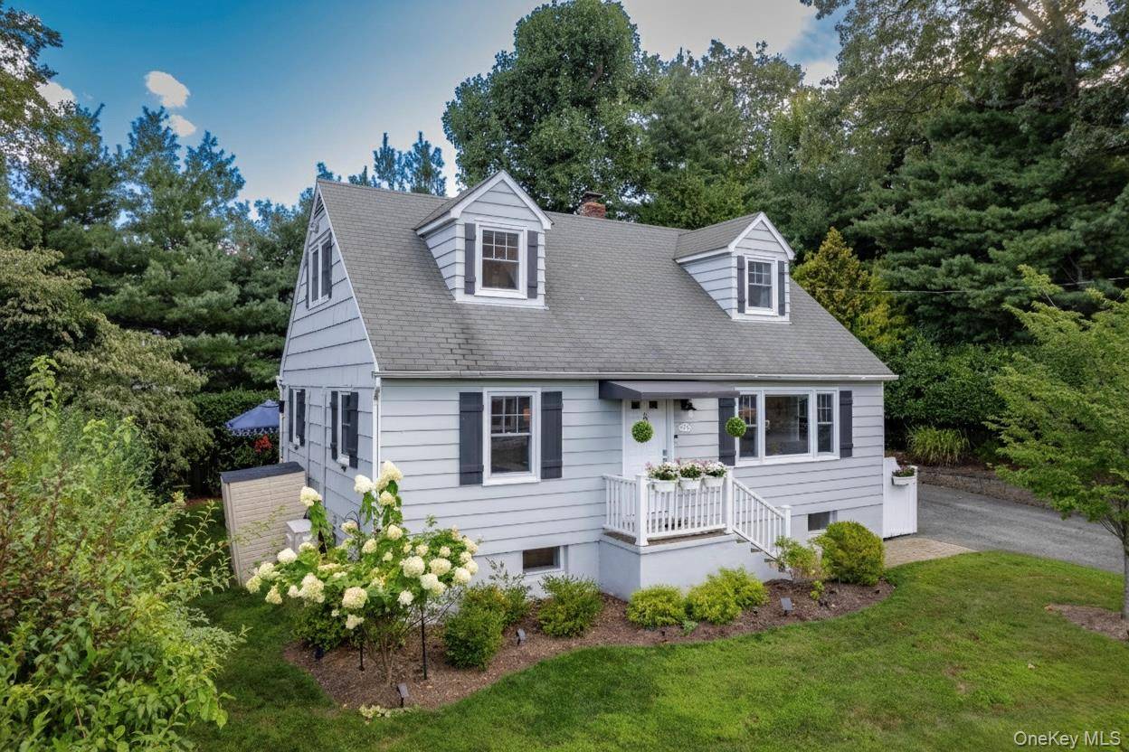 In Upper Nyack, just moments from the Hudson River and the energy of Nyack village life, this Cape Cod makes every day feel like a getaway.
