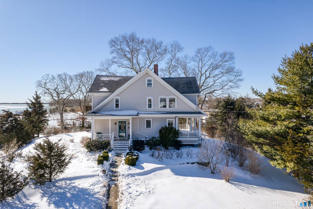 This beautiful B4 zoned waterfront property on the Madison Clinton line provides flexibility as a professional headquarters or a live work opportunity.