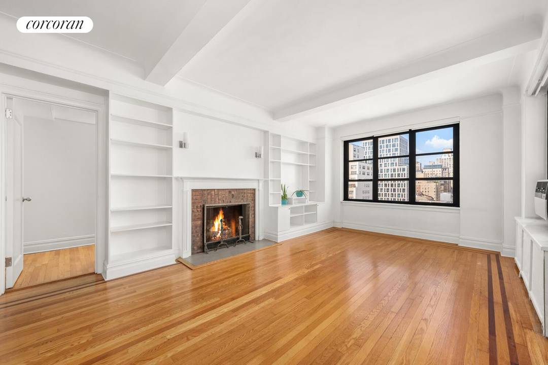 SPECTACULAR OPPORTUNITY IN GRAMERCY LARGE, BRIGHT, CHARMING 1 BDRM W WOOD BURNING FIREPLACE AND PRIVATE SOUTH FACING TERRACE.