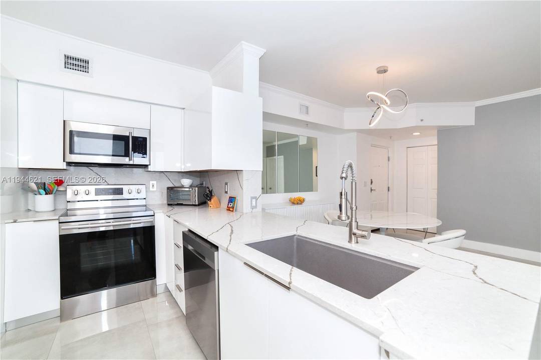 STUNNING 2 Bed 2 Bath Turnkey Grand Penthouse in the heart of Sunny Isles Beach.