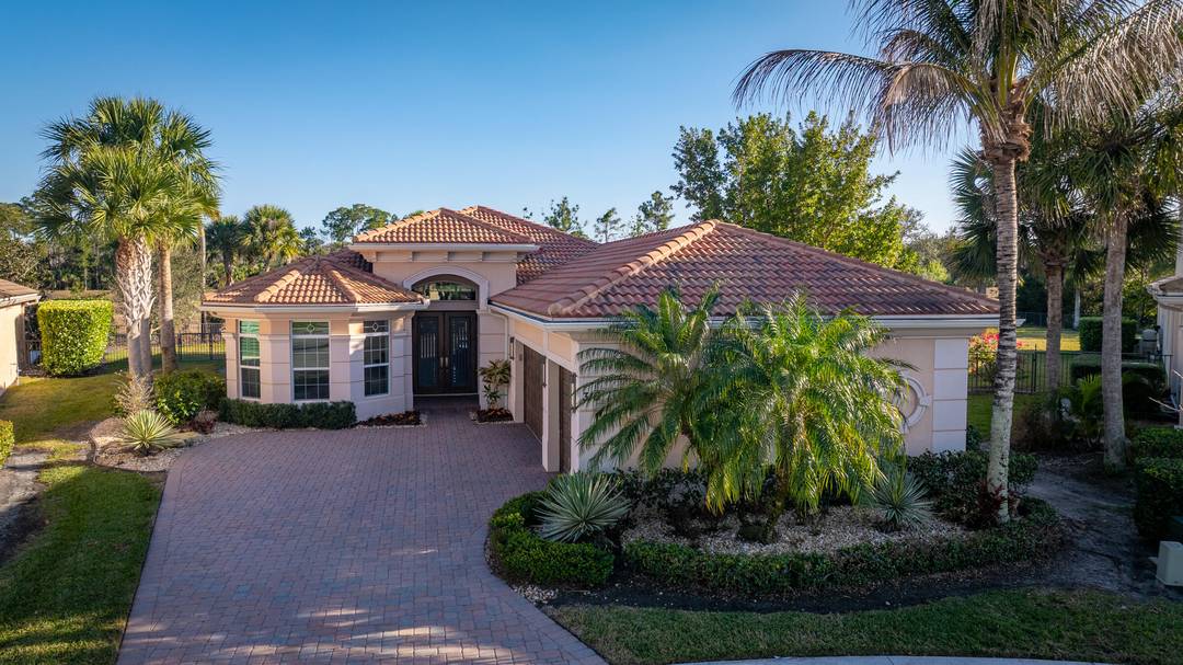 Extraordinary opportunity to own a turn key, 3 bedroom plus large office 4th bedroom, 3 full baths Salerno extended model home in the coveted, gated community of Jupiter Country Club.