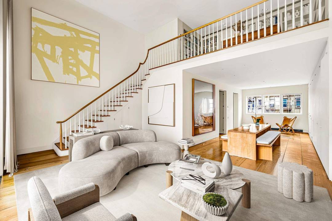 This extraordinary mint condition triplex penthouse at 52 West 9th Street is a light filled, architecturally significant residence on one of Greenwich Village s most distinguished blocks.
