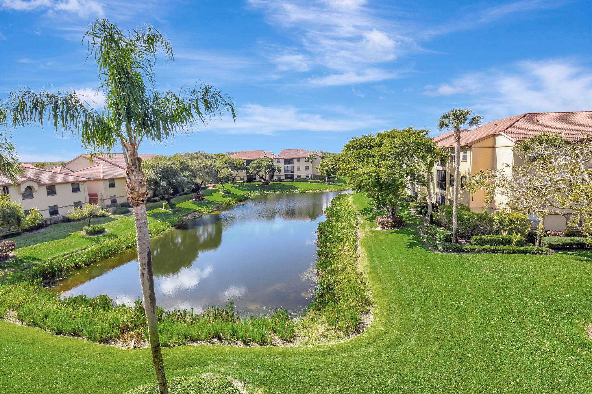 Welcome to this spacious 3 bedroom, 2 full bathroom condo with a sparkling lake view.