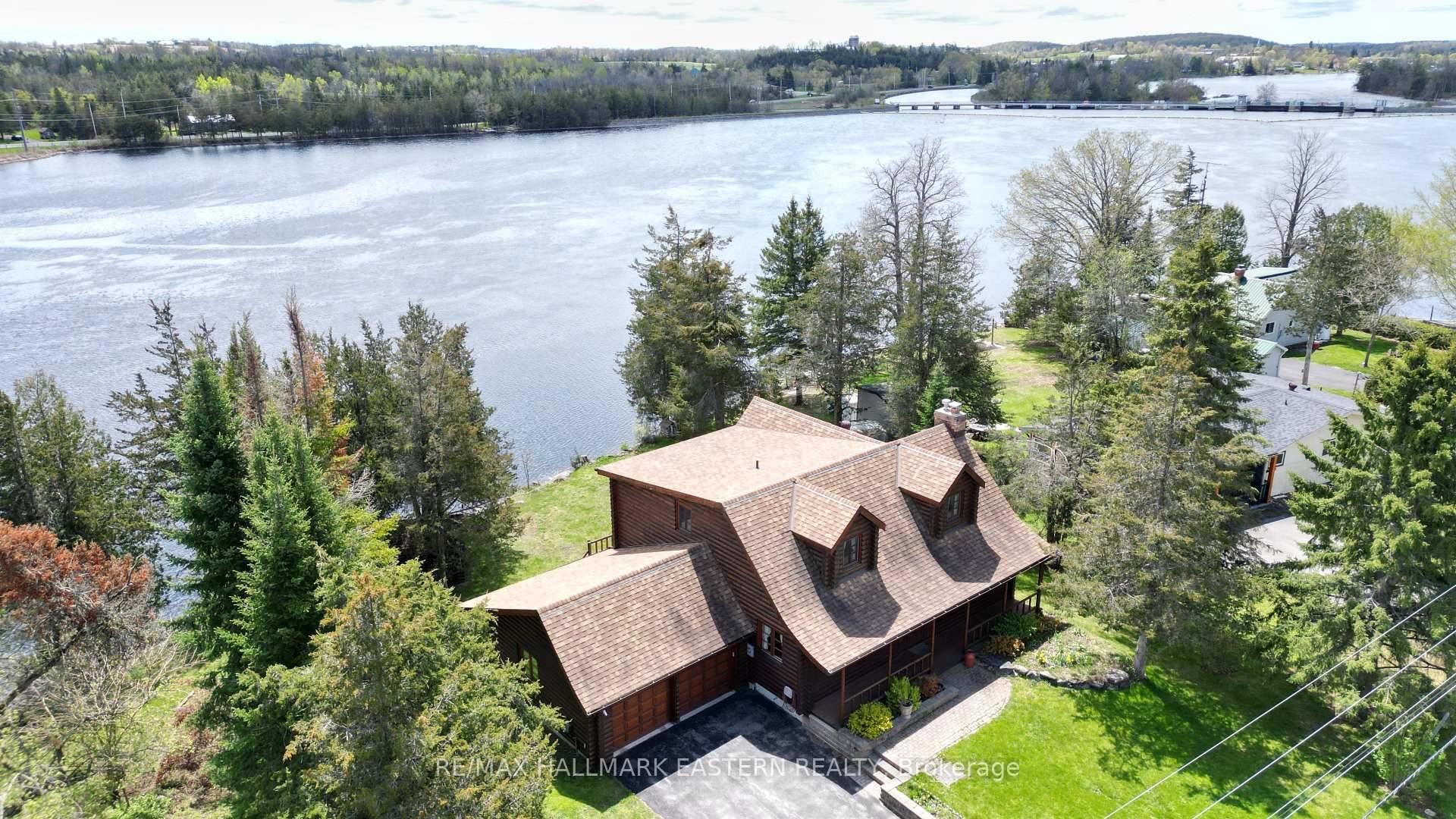 CAMPBELLFORD This stunning 2 1 bedroom, 2 bathroom Laurentian inspired log veneer home with an attached double garage offers 90 feet of deep waterfront on the Trent River between Locks ...