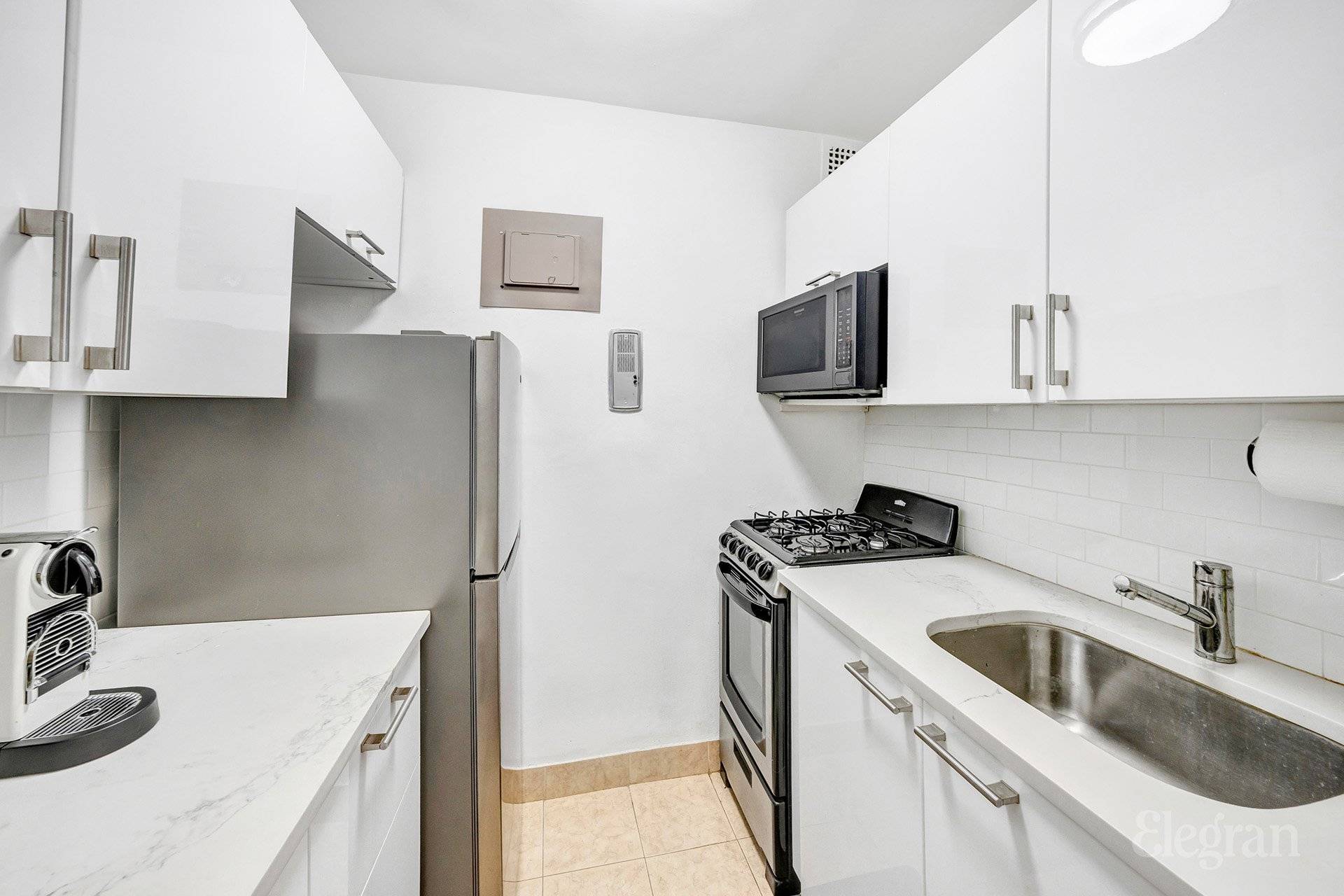 South Facing Sunny, Renovated Alcove Studio in the full service Murray Hill Crescent Enjoy natural light and open skyline views to the South.