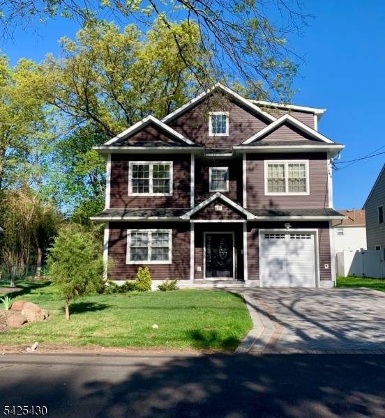 PROF PIC 4 22 ! Stunning newer construction 2023 offering modern design, quality craftsmanship, and exceptional functionality, set on a quiet residential street in Cranford.