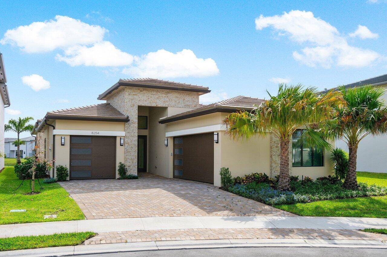 Discover the perfect blend of luxury and tranquility in this never lived in Bermuda model home, located in the prestigious Lotus Palm community of Boca Raton.