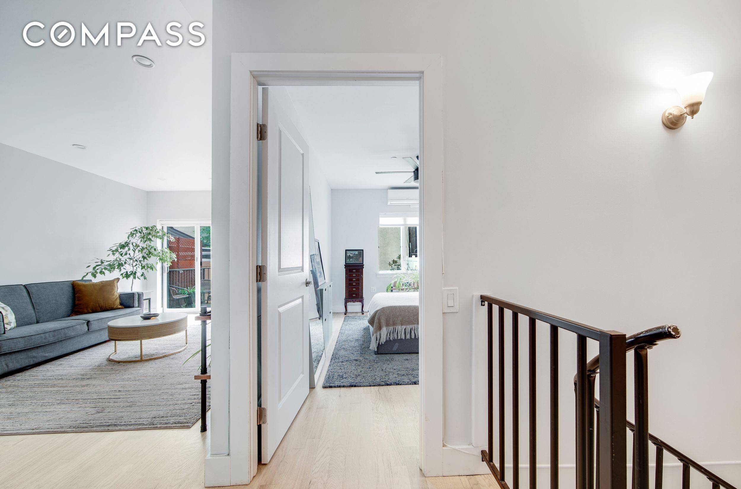This rare 1, 094 SF duplex condo lives like a two bedroom, with 1.
