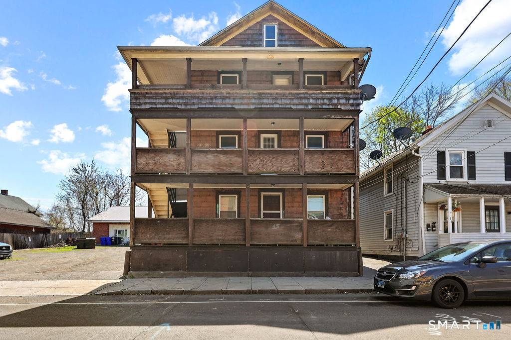 Exceptional mixed use investment opportunity in Middletown, with views of CT River and landmark Arrigoni Bridge.