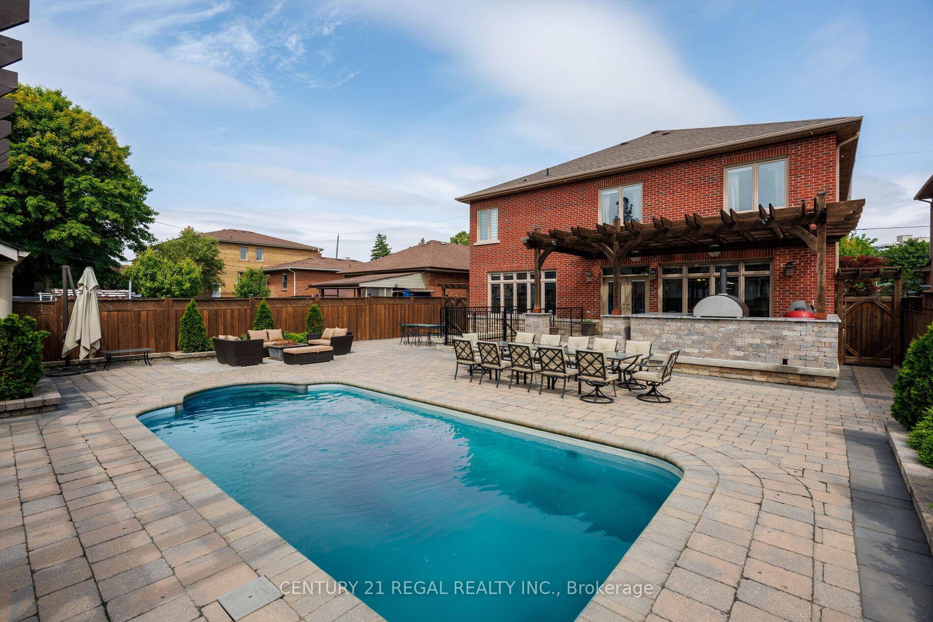 Step into refined living at 127 Sultana Avenue a custom built gem tucked away on a quiet dead end street, just steps from a park.