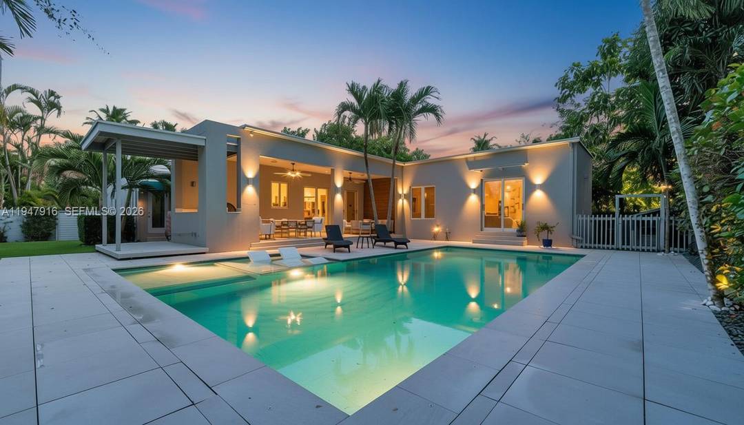Welcome to one of the most spectacular pool homes in lush Biscayne Park, set on a quiet, tree lined street and one of Miami s most prestigious and top rated ...