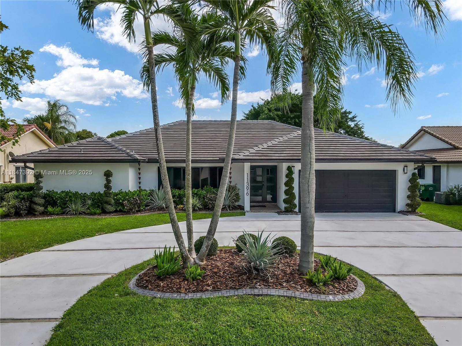 3003 total square feet ultra modern and fully remodeled waterfront pool home in Coral Springs.