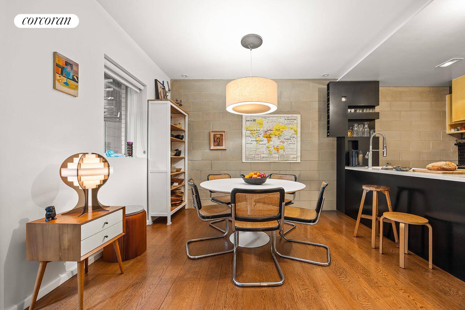 This 1, 700 square foot duplex offers a rare townhouse alternative, quietly set on one of Greenwood's most beautiful blocks.