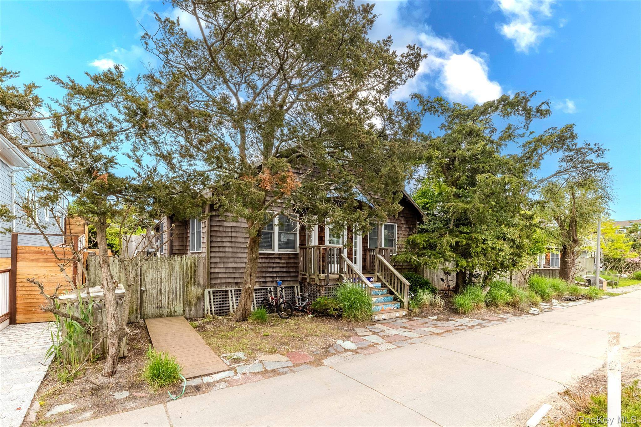 This completely renovated 4 bedroom Ocean Beach home for sale with a large pool is situated on an oversized 75' x 84' lot, south of Midway.