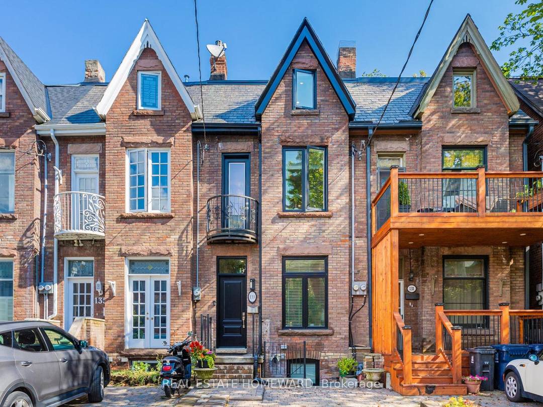 Rarely offered, fully renovated rowhouse duplex with accessory unit.