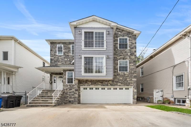 MOVE IN READY MULTI FAMILY Welcome to 117 Sayre St, a well maintained two family home nestled in Elizabeth's desirable Elmora section.