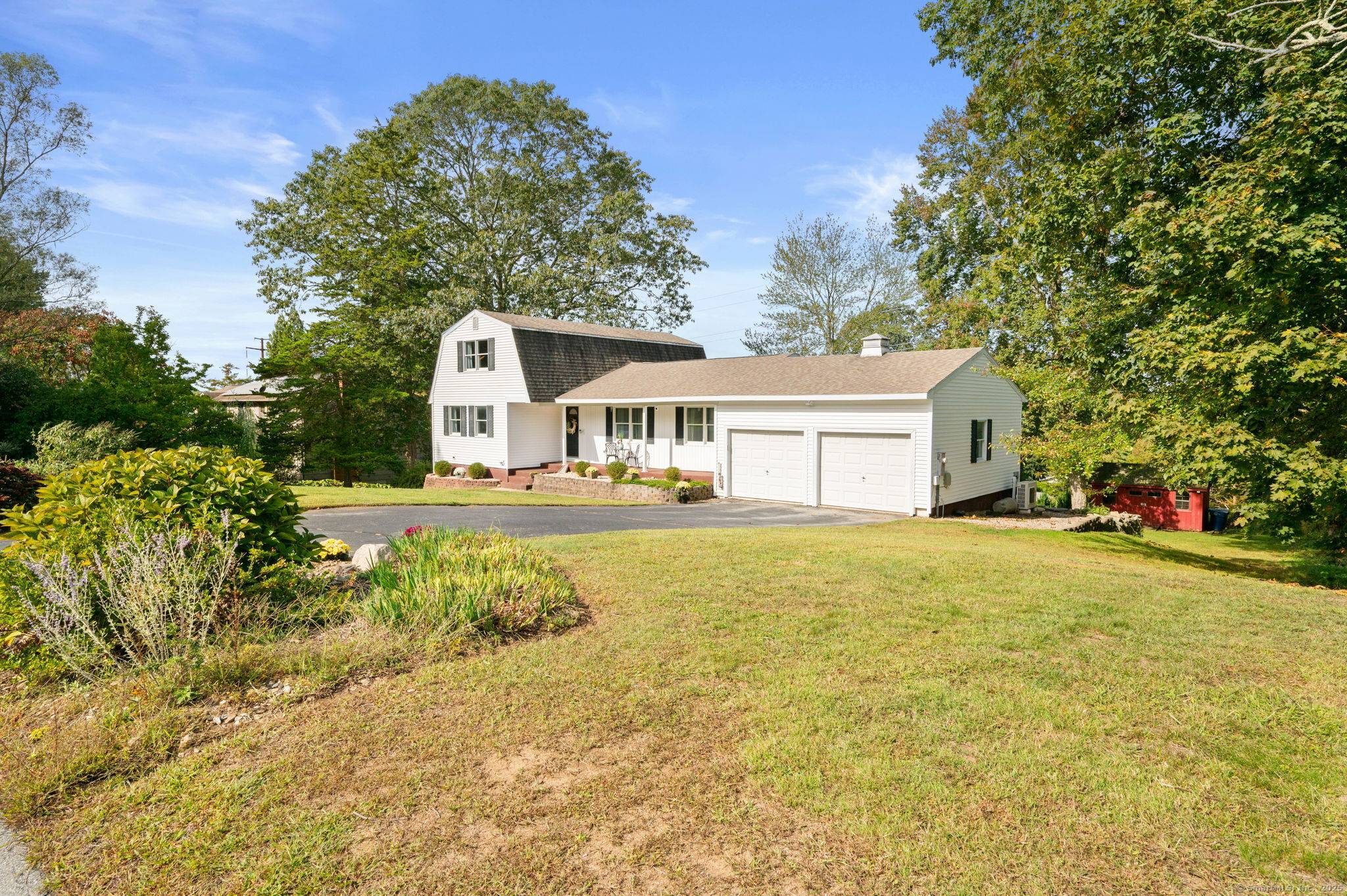 This five bedroom Colonial sits on a half acre lot in a well established, quiet neighborhood.