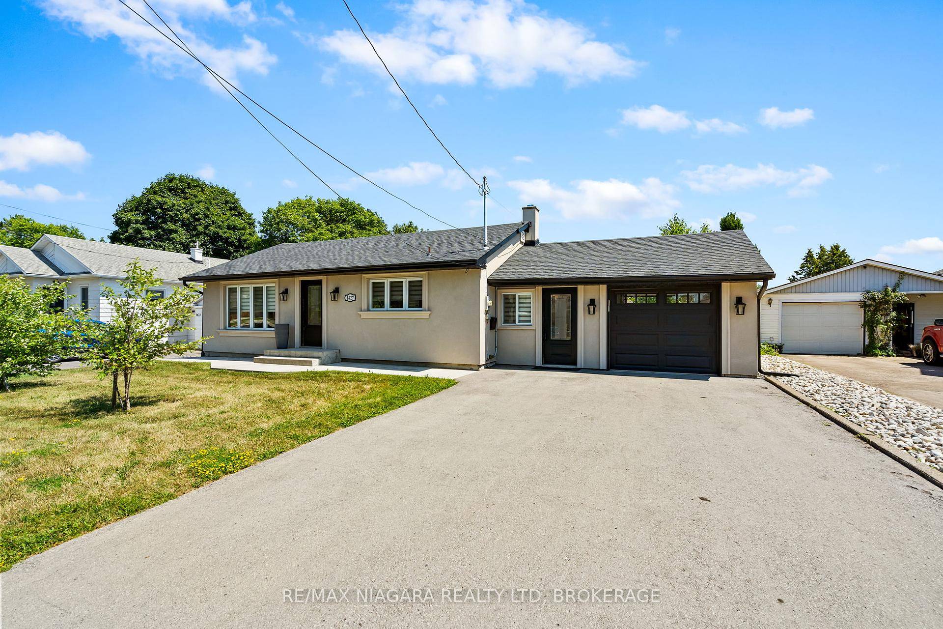 Turn key and move in ready, this stunning and beautifully updated bungalow is situated in the heart of Virgil on a rarely available premium 60x200 fully fenced lot.